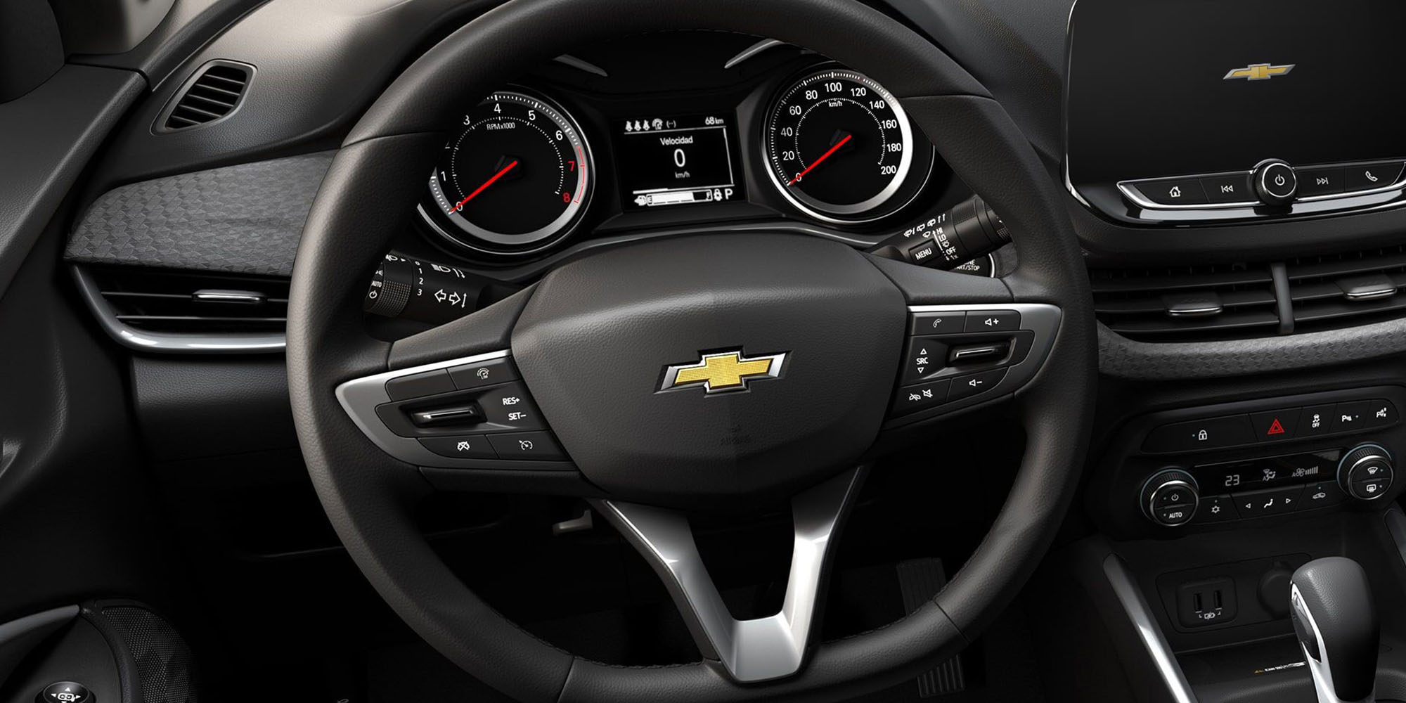 Vista cercana del volante con cluster digital del Onix.